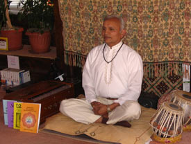 Shanti with some of the books he has written